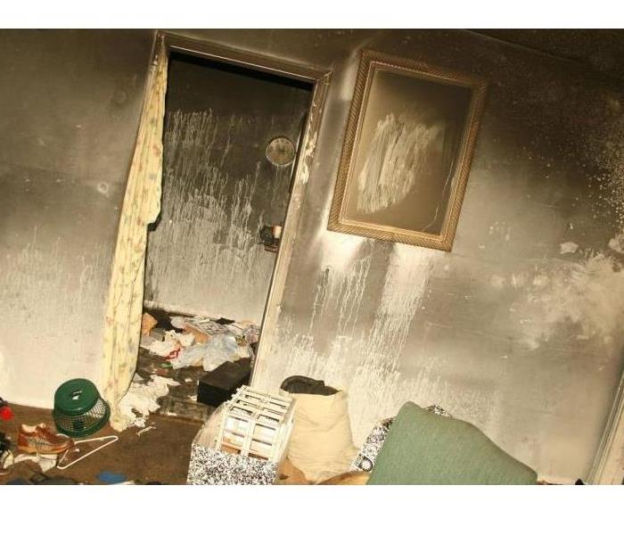 A picture showing soot damage on walls and ceiling